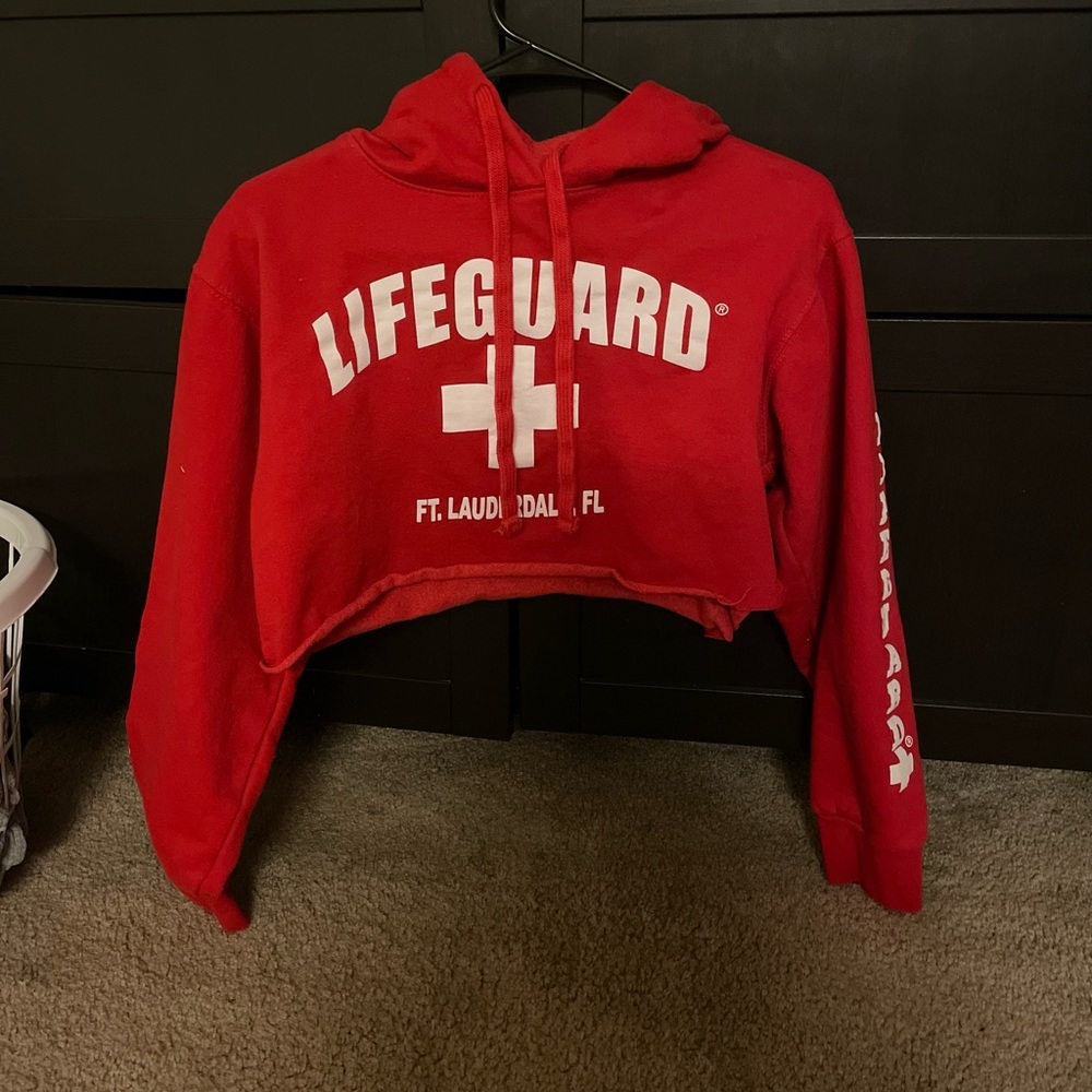 Small, red lifeguard crop tee